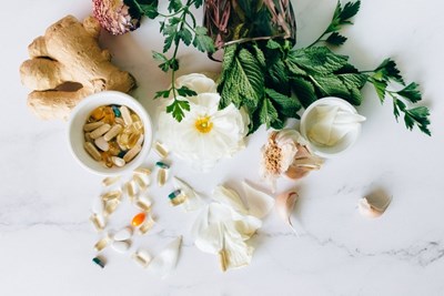 An image of supplements and ingredients that are used in them to talk about whether you need supplements to stay healthy. 